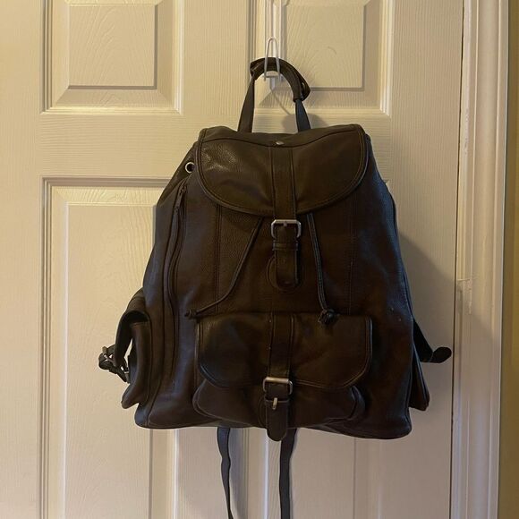 Vintage leather Brown Large Backpack saddle bag. antique tone hardwares.